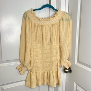 Cream ruched off the shoulder dress